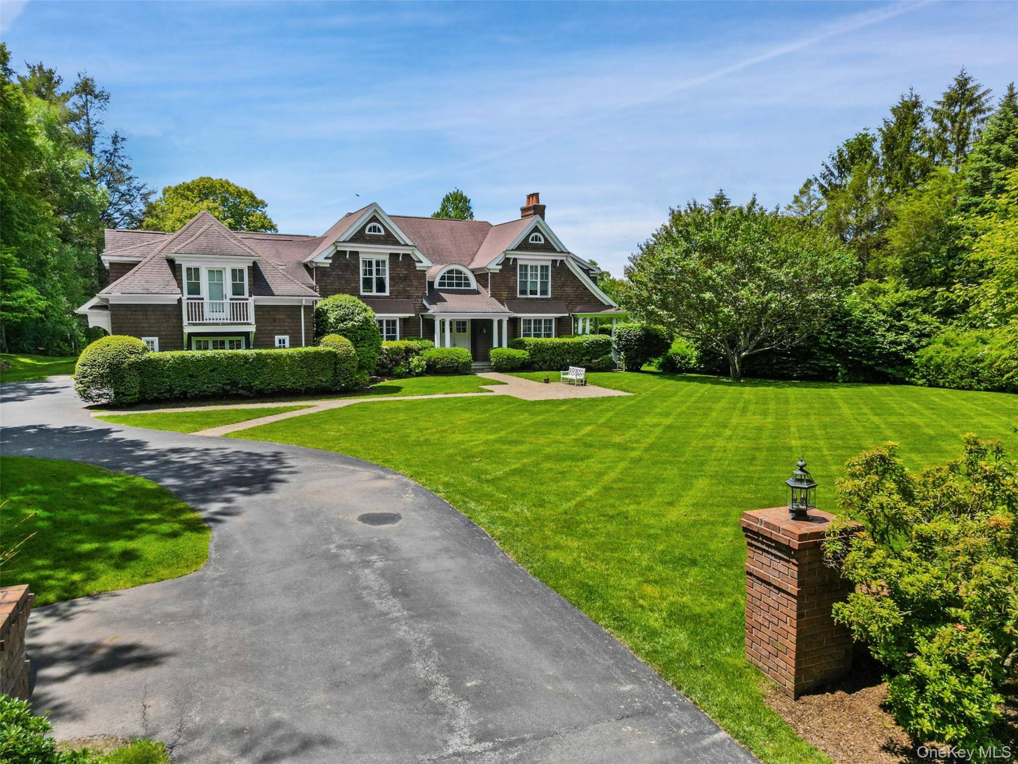 Located in the coveted Whippoorwill estate area, 61 Carolyn Place presides on 2.