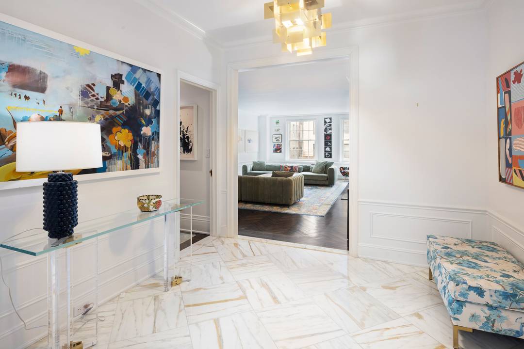MOVE RIGHT IN. Located directly across the street from the Metropolitan Museum, this beautiful 7 room residence has been lovingly restored to seamlessly blend timeless charm with modern sophistication.