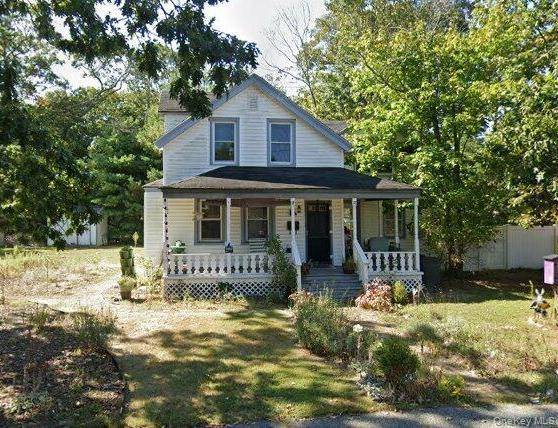 Older Colonial with a large lot for expansion to add a garage or a pool, updated kitchen and main bath but will use some elbow grease to make it your ...