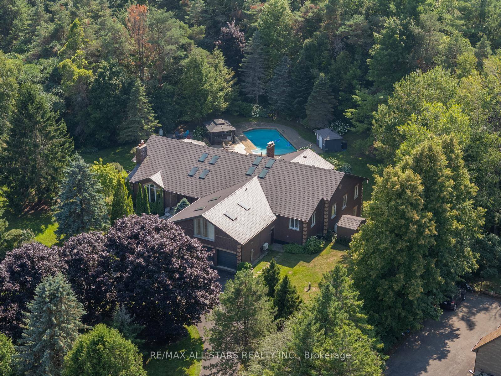 Welcome to 64 Woodbridge Circle, an exquisite estate home nestled within the prestigious Oakridge Golf Course community.