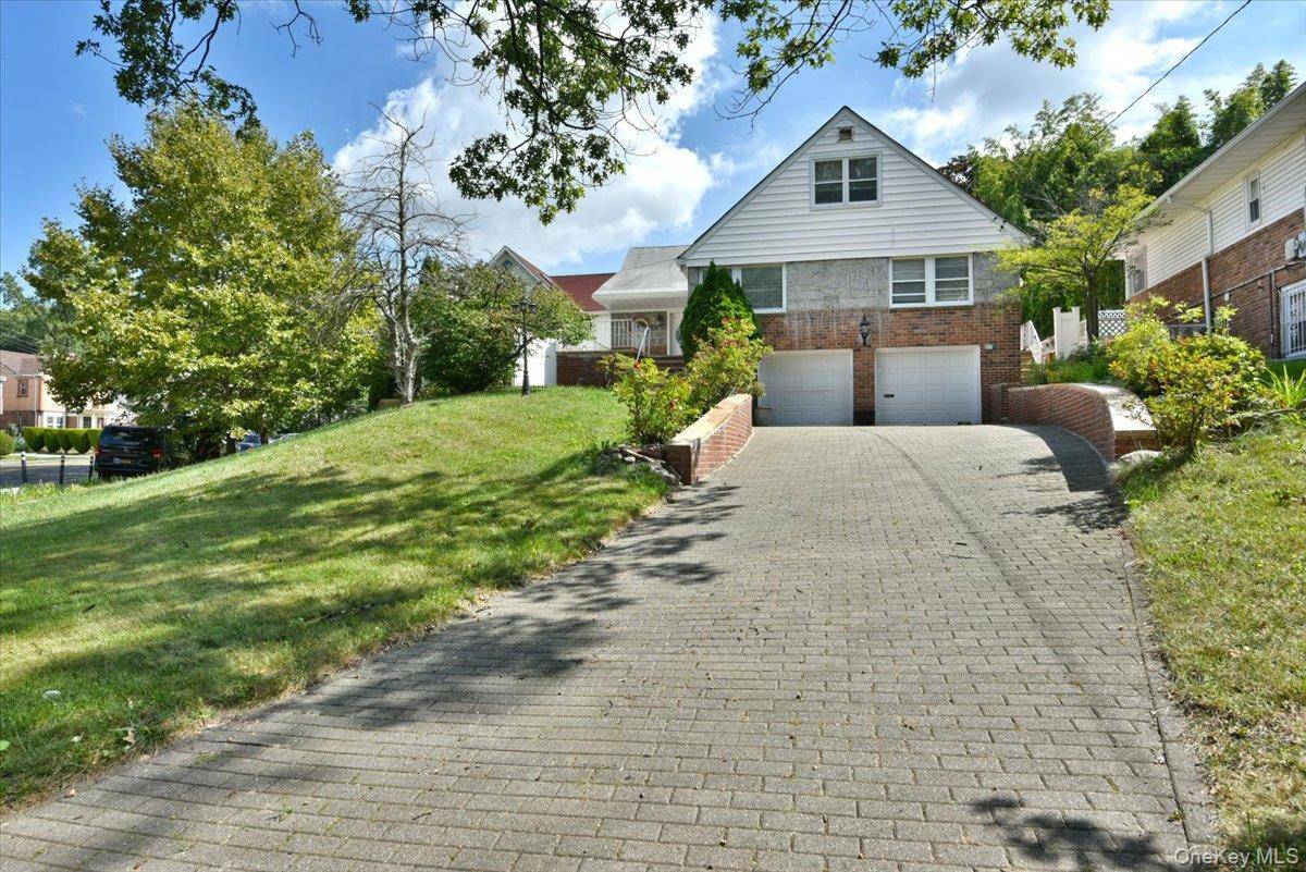 Welcome to this completely renovated colonial in the heart of Holliswood a neighborhood known for its prestigious charm and convenience.