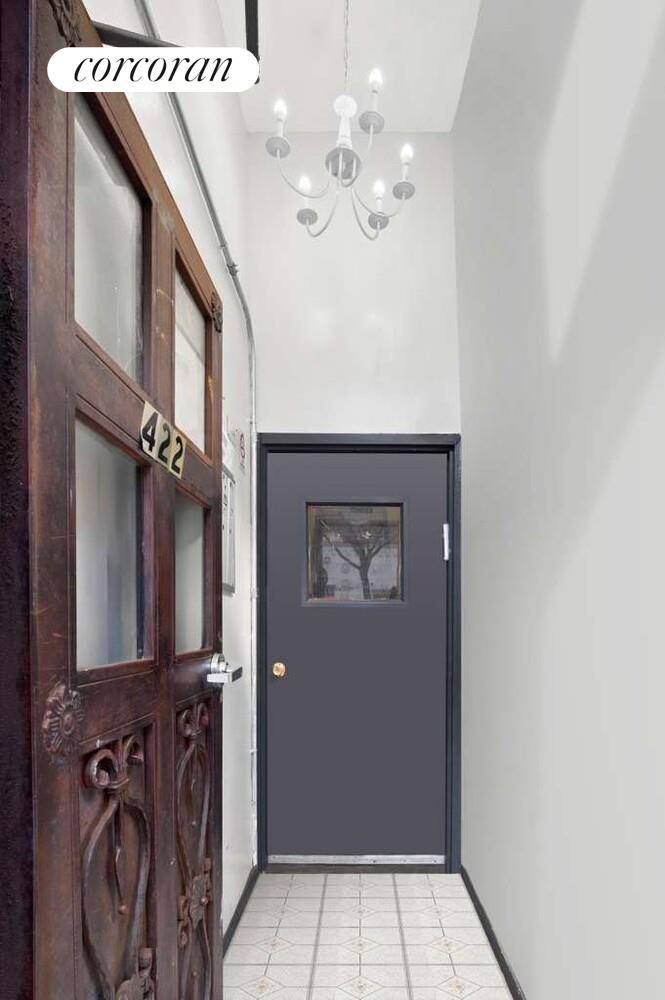 422 Troy Avenue is currently set up as a three family.