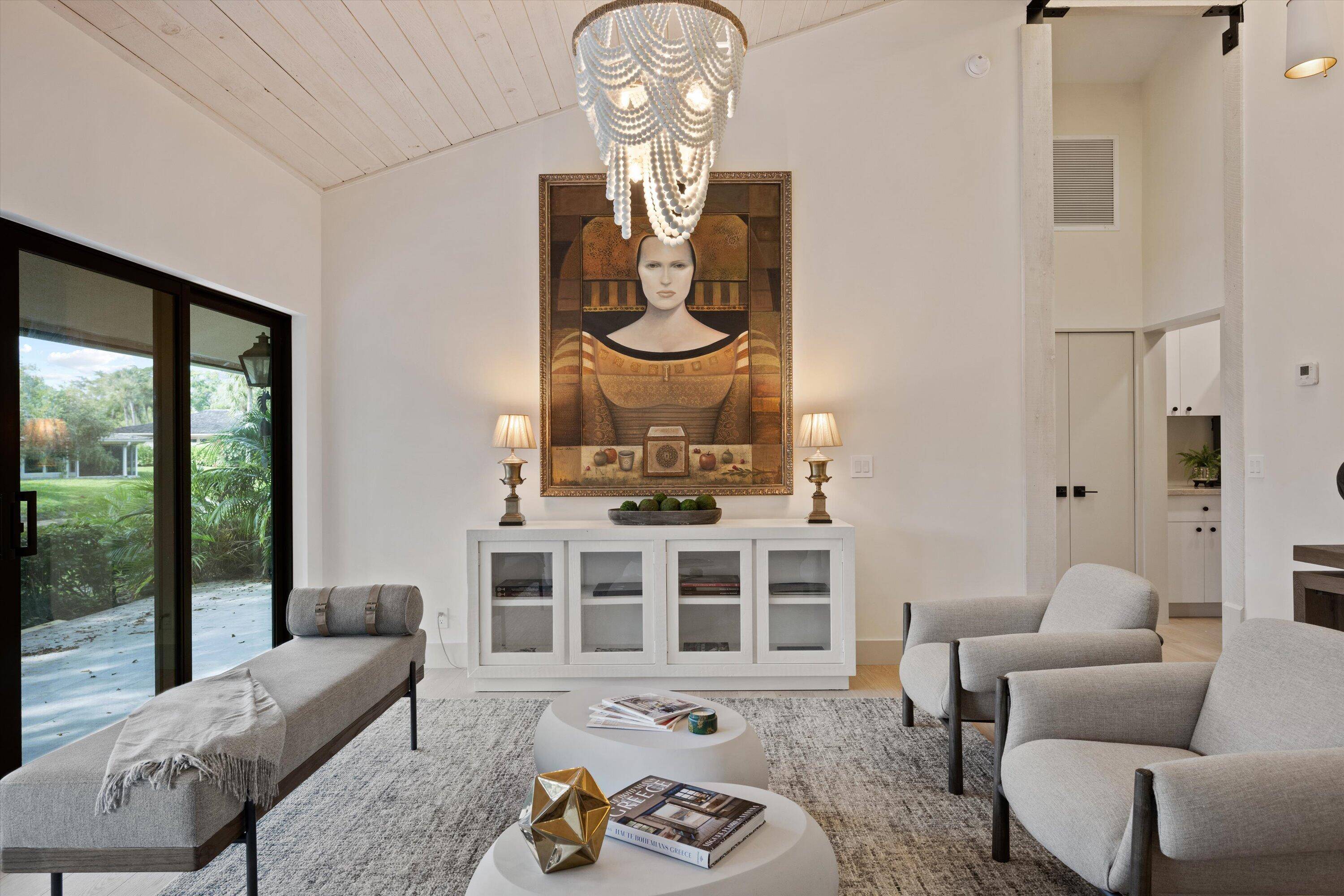 Step into timeless elegance with this completely renovated 3 bedroom, 3 bathroom courtyard bungalow in the prestigious Palm Beach Polo community.