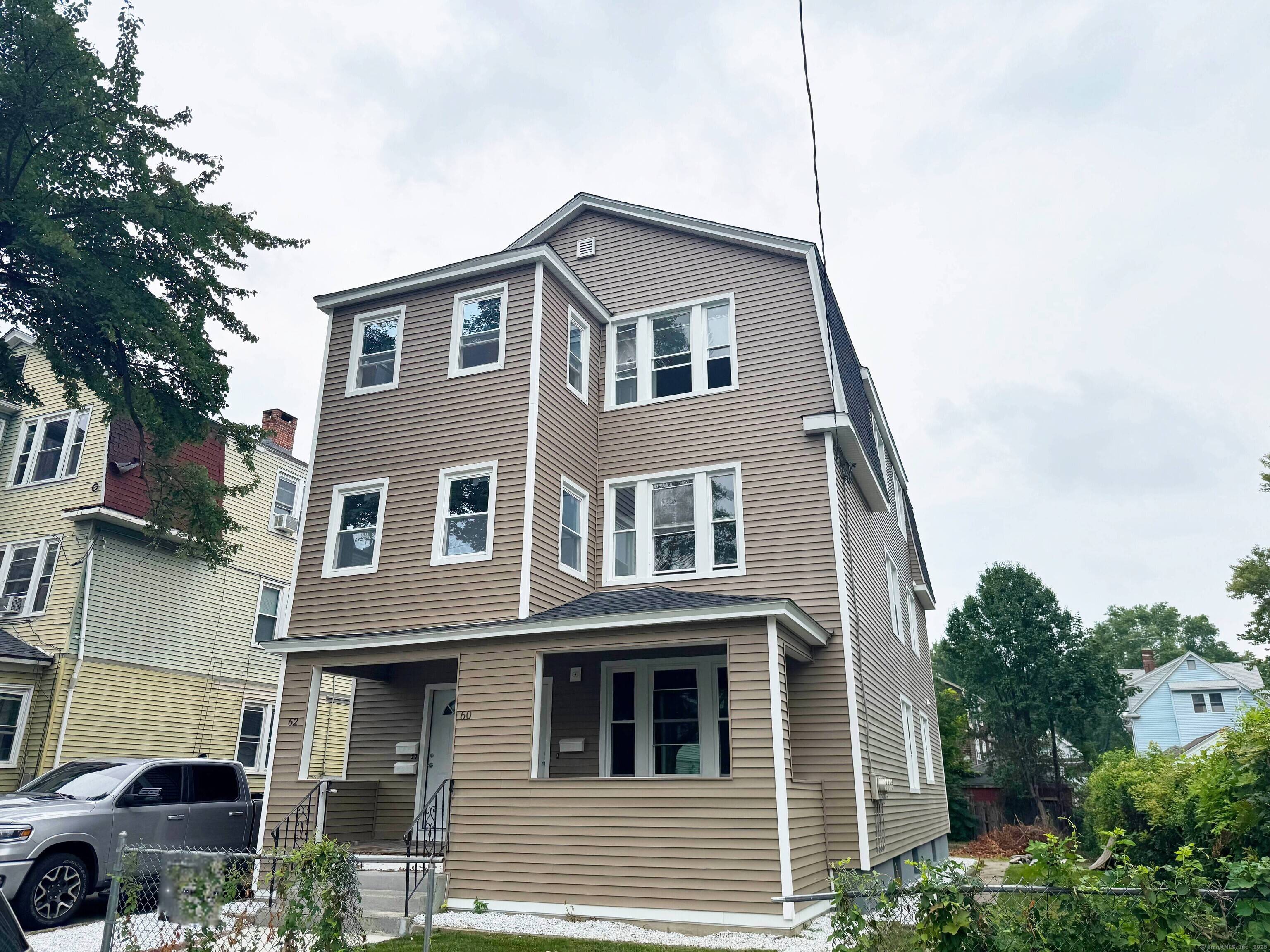COMING SOON ! Welcome to 60 62 Arnold Street, a beautifully restored three family property that blends modern design with timeless charm.