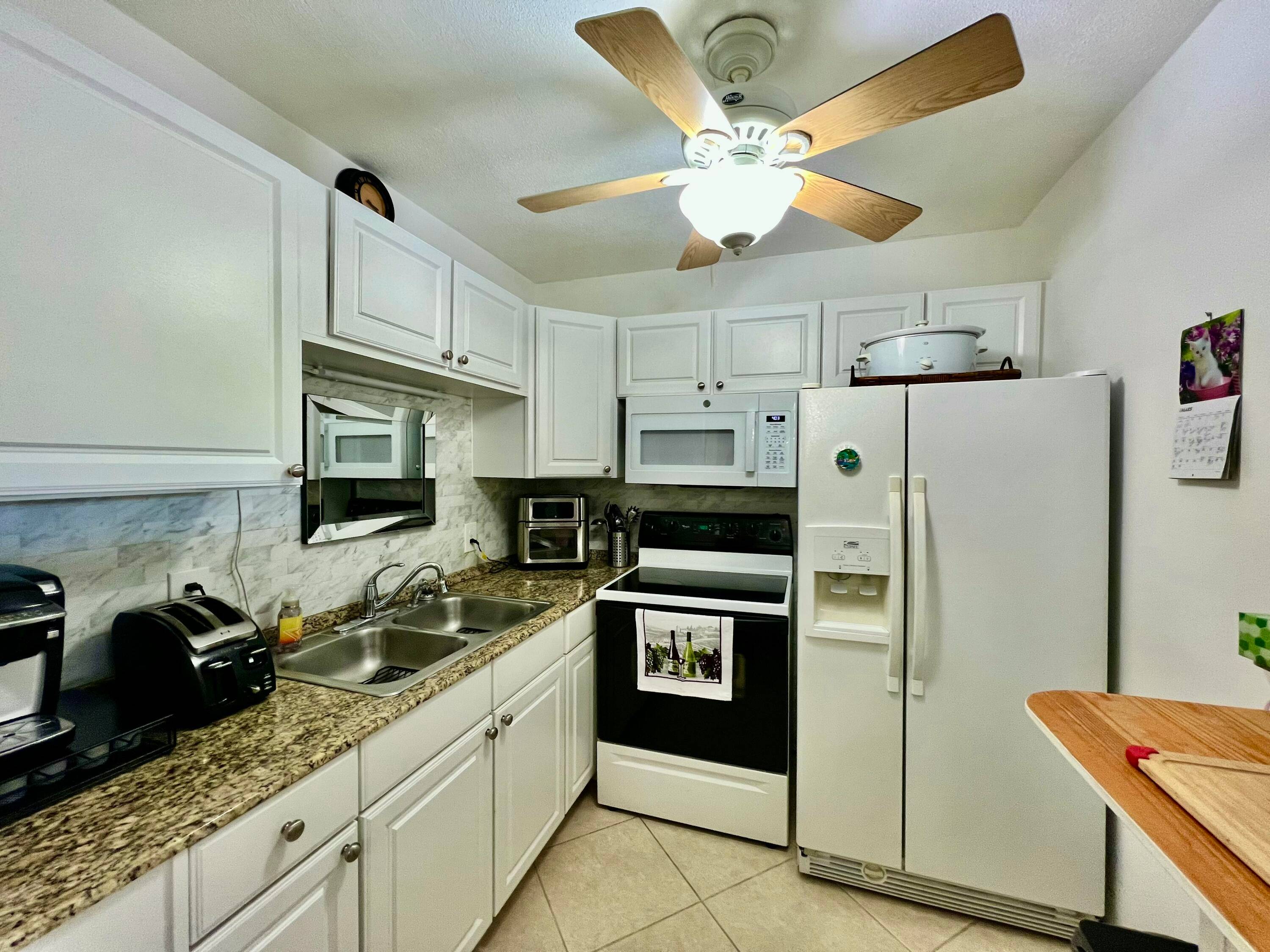 Charming Remodeled Condo in Century Village EastWelcome to this cozy and beautifully remodeled second floor unit in a low rise building, nestled in one of the most peaceful areas of ...