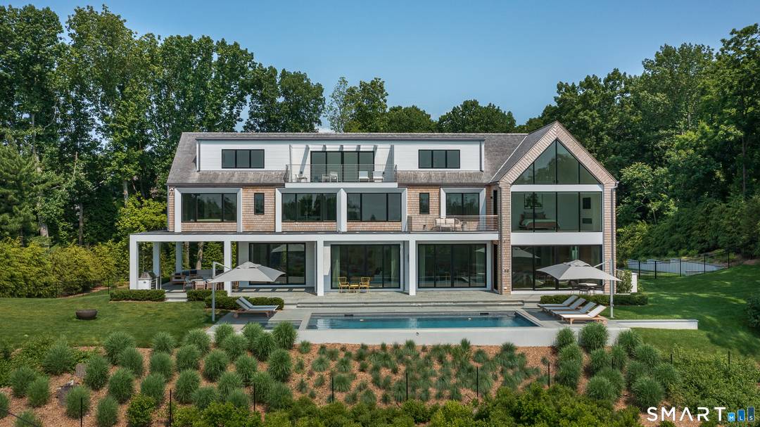 Like new custom modern home with open concept living designed for comfort and entertaining.