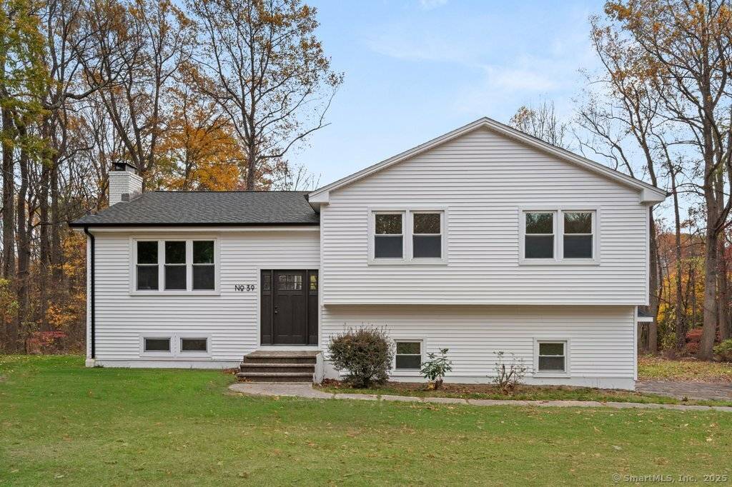 Crisp white siding and clean lines welcome you to this fully remodeled Shelton home.