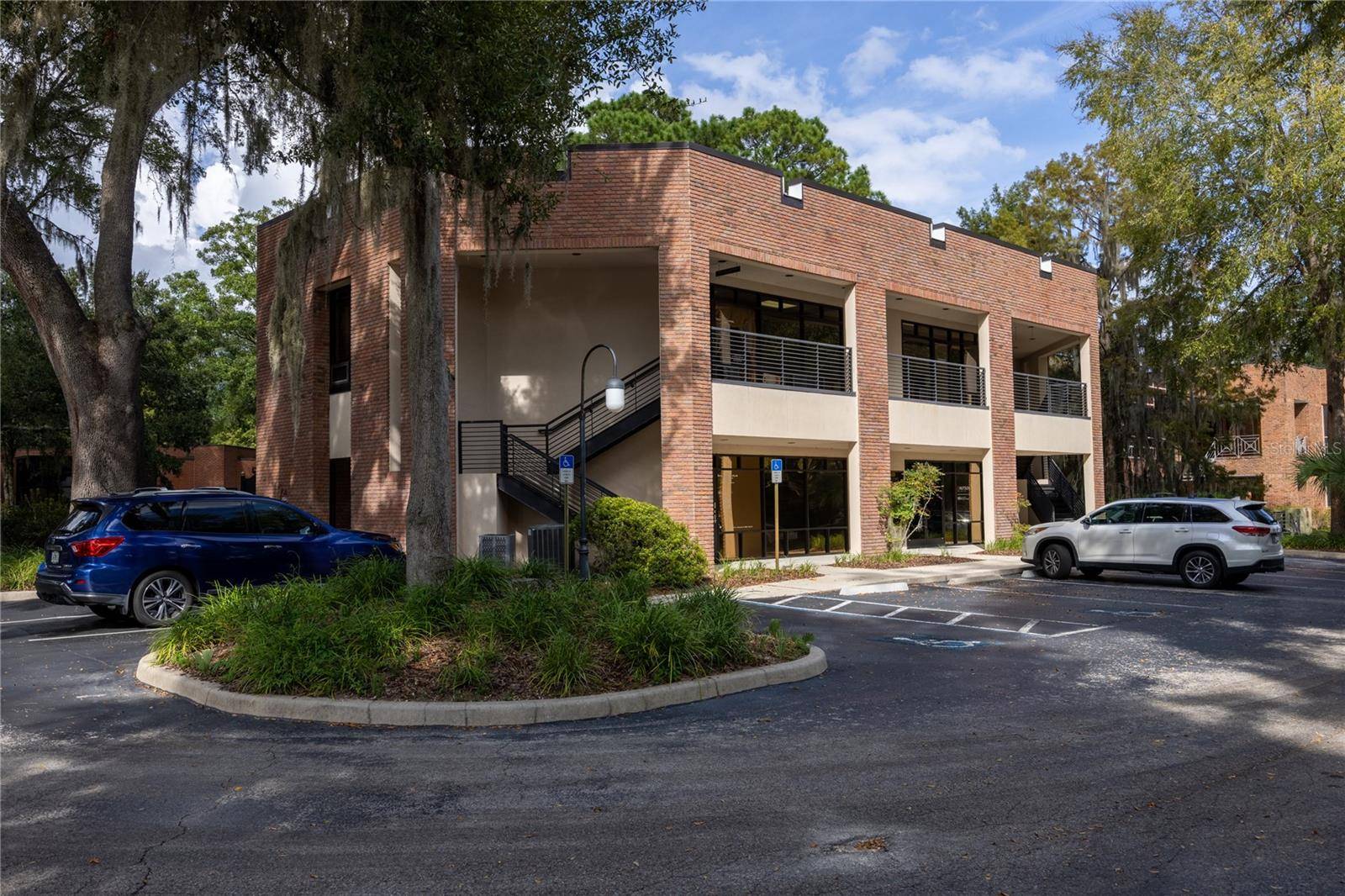 Features two large executive offices, a conference room, a waiting area, and a full reception office with space for administrative staff.