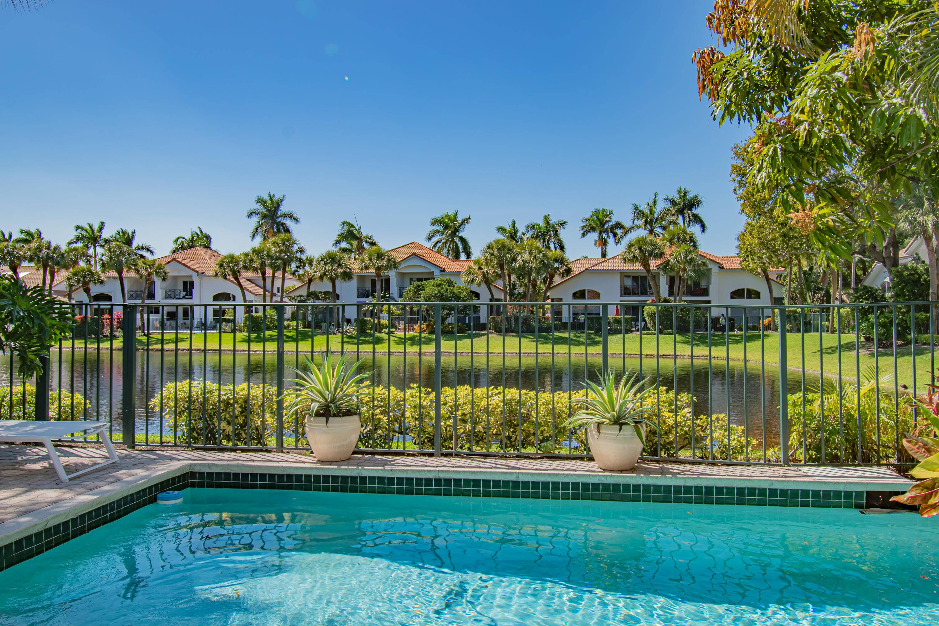 This spacious and bright one story pool home is located in the Sound community of Boca Raton.