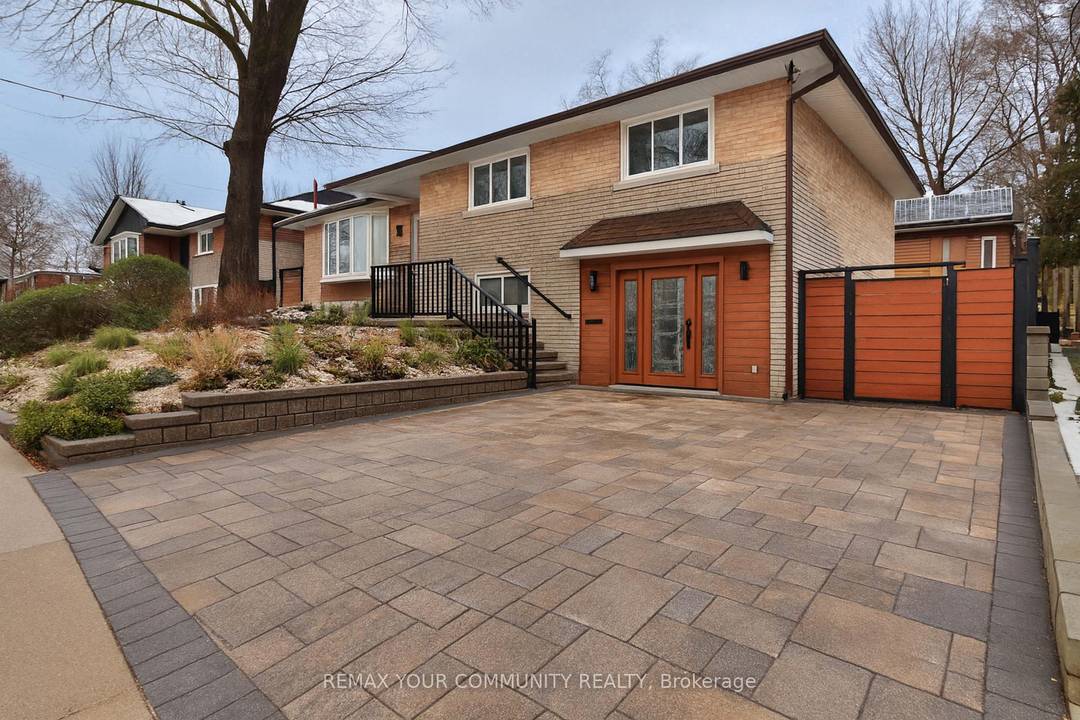 Lower level of raised bungalow nestled.