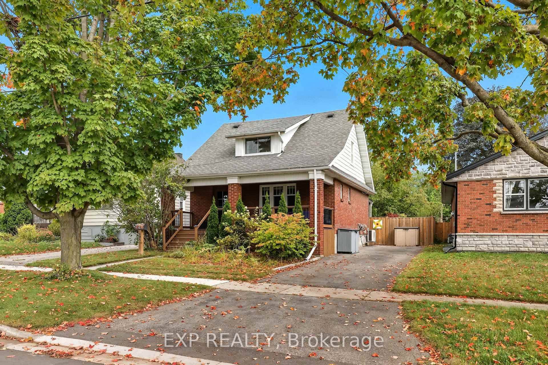 Set on a quiet, treelined street, this brick home welcomes you with a tidy front garden, a stone walkway, amp ; a large, sheltered front deck, perfect for morning coffee ...