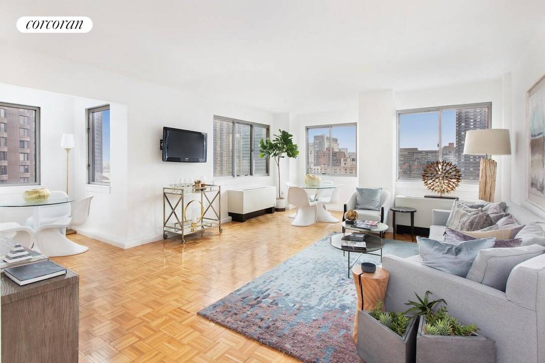 This two bedroom, two bath home has an expansive living and dining room with views of the East River, lower Manhattan and Empire State Building.