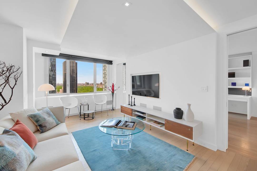 This split 2 bedroom, 2. 5 bath home boasts glorious Central Park views throughout and unique custom upgrades, including pocket doors on either side of the bedrooms, built ins, fully ...