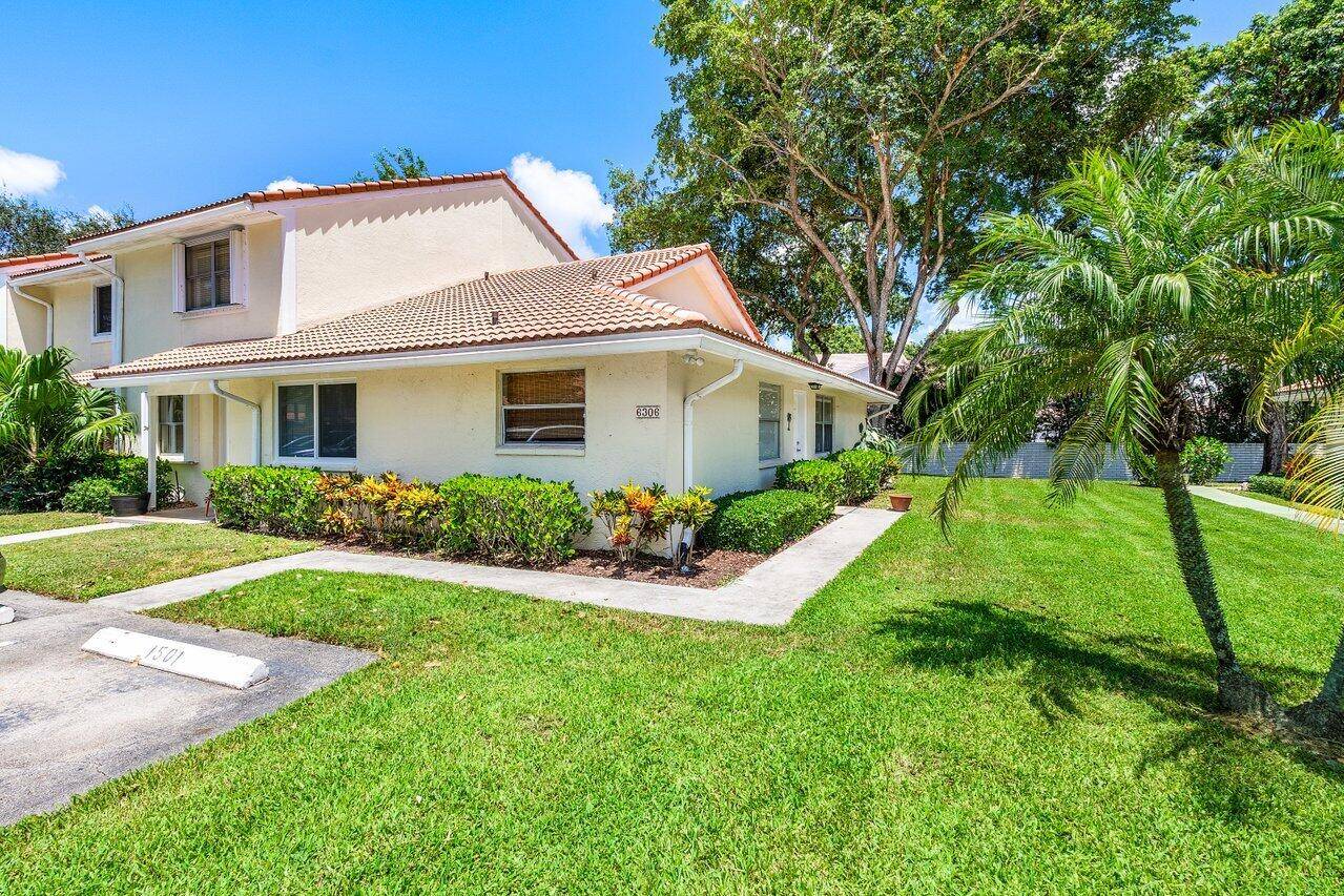 Spacious 2BR 2BA corner unit villa in a desirable low HOA Boca Raton community.