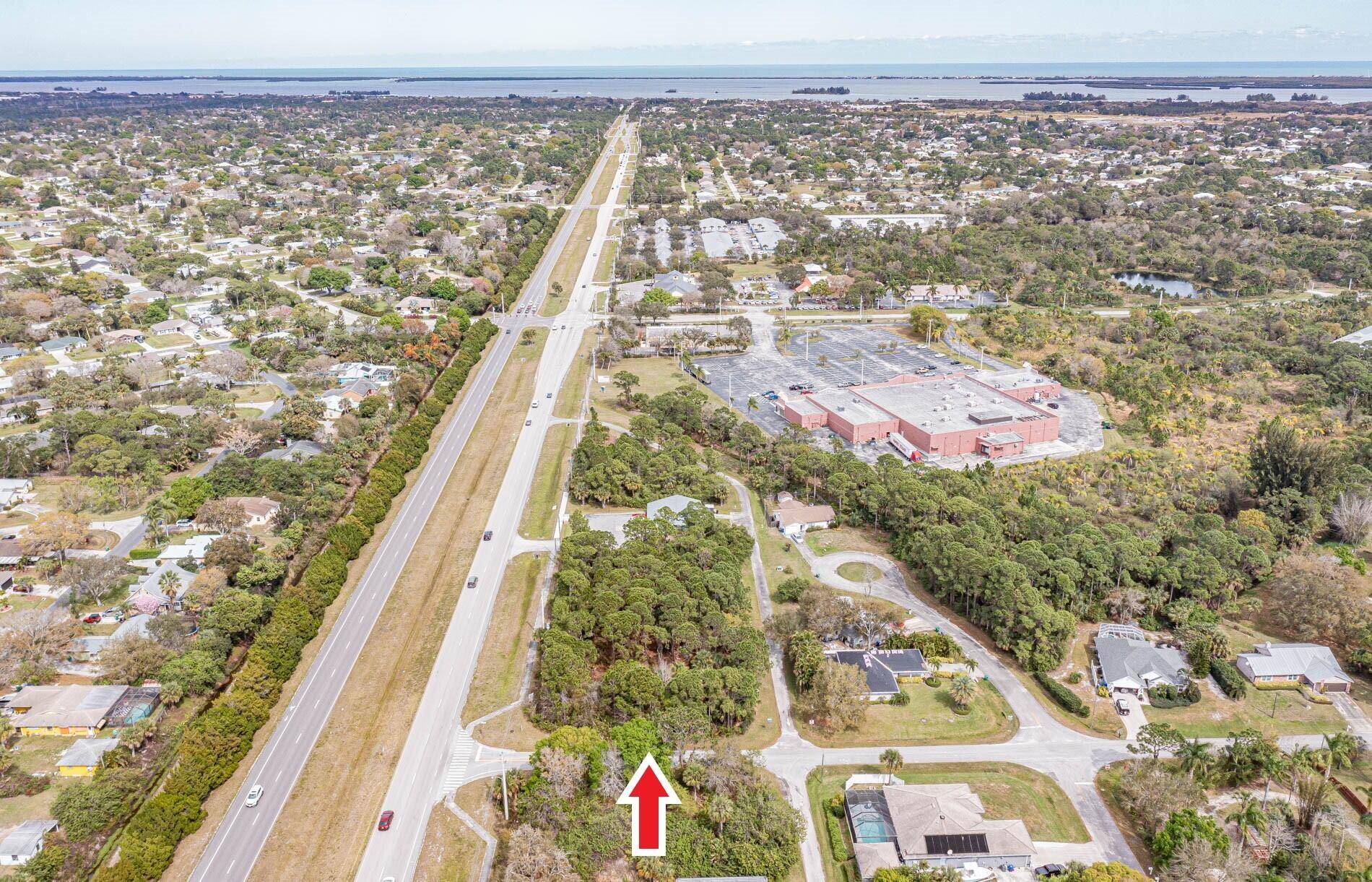 This corner lot fronts County Road 512 and is being sold with the neighboring lot, 791 Sebastian Boulevard.