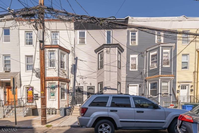 Welcome to this beautifully renovated two family home in the heart of Elizabeth, where modern design and comfort come together seamlessly.