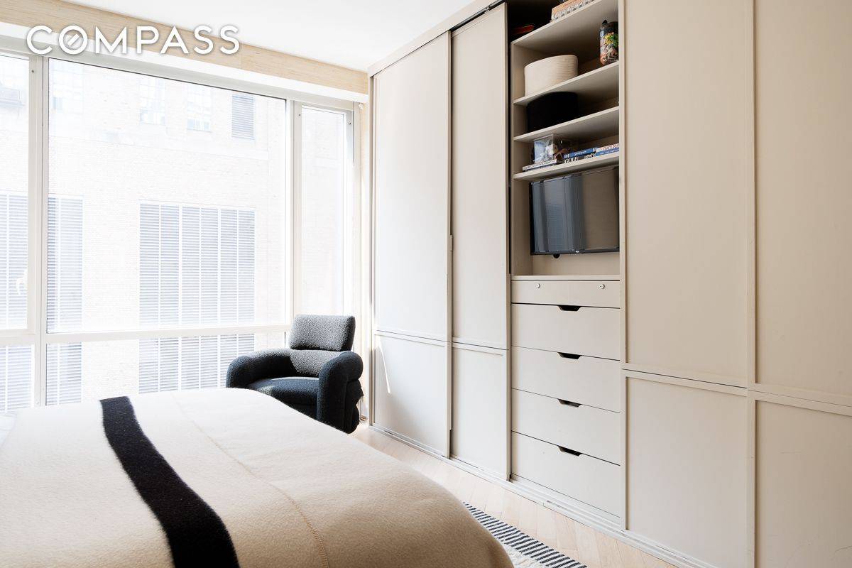 Welcome to luxury living at its finest in this stunning 2 bedroom, 2 bathroom condo located at 330 Spring St, Manhattan, NY.