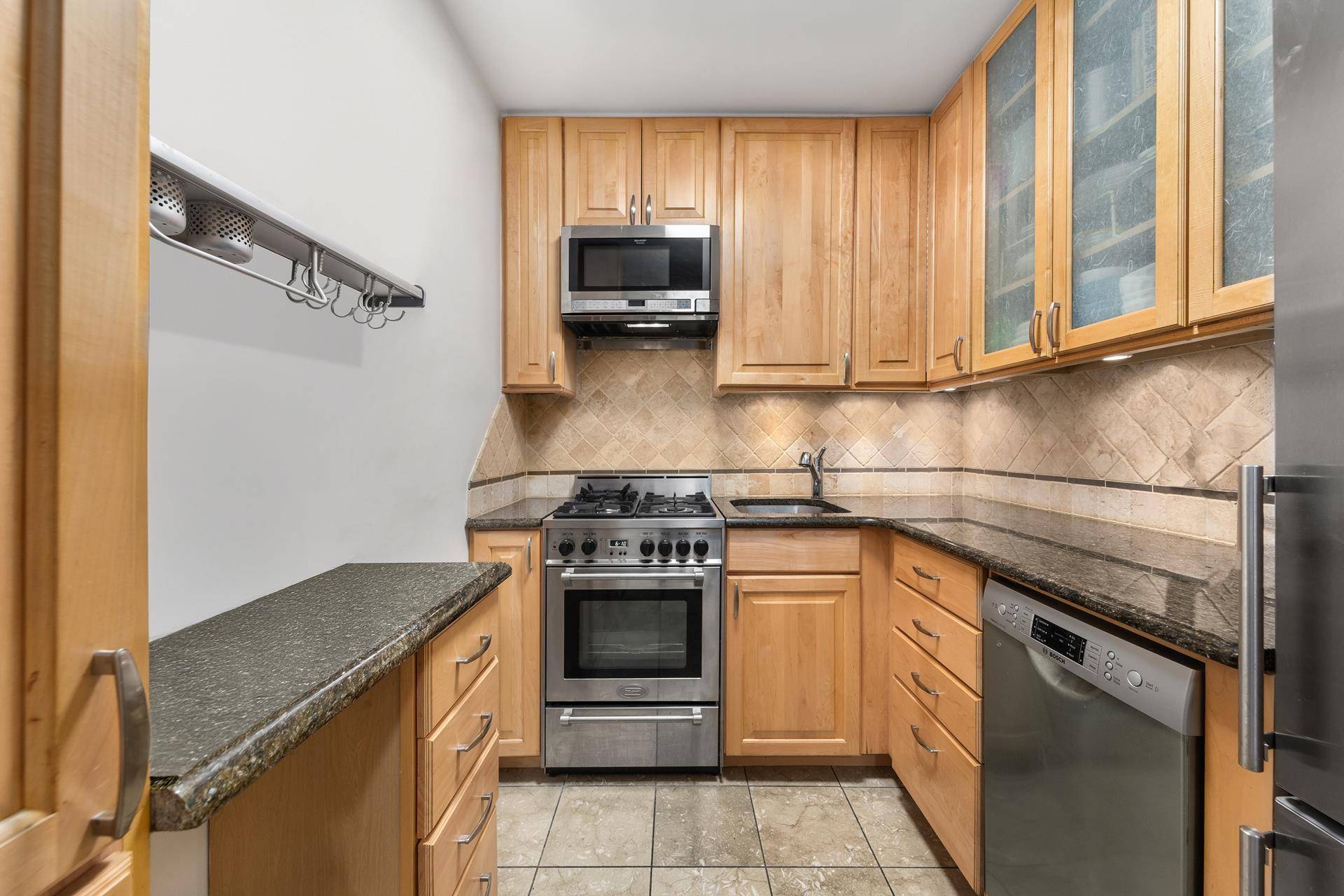 Welcome to Apartment 2C at 145 East 15th Street a thoughtfully converted Junior 1 bedroom in one of Gramercy's most sought after full service co ops.