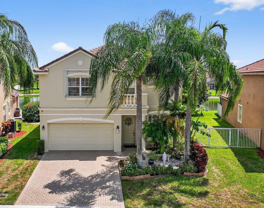 Rarely Available Estate Home in Central Boca Raton Man Gated Community with Stunning Lake Views !