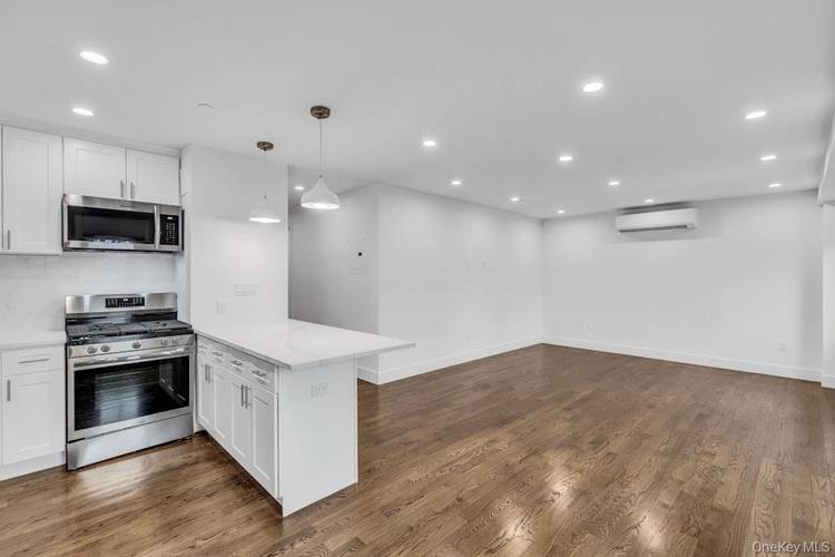Brand new, beautifully constructed second floor one bedroom, one full bath apartment.