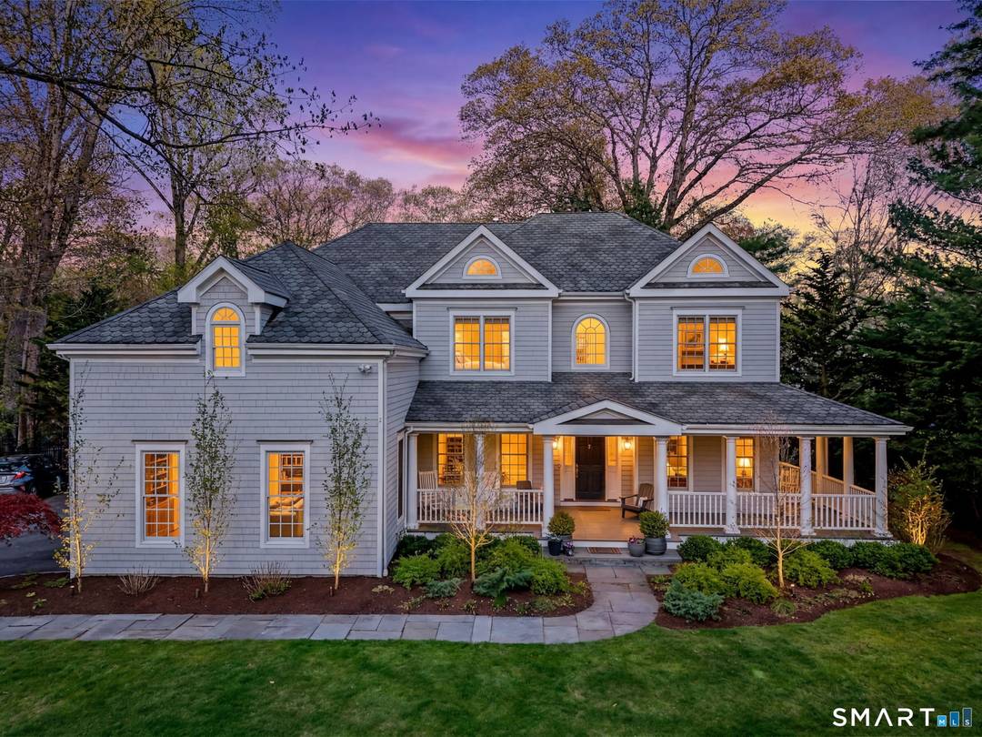 Set on a quiet street in the seaside village of Rowayton, 12 Ledge Road captures the essence of coastal living with an easy walk to town lifestyle.