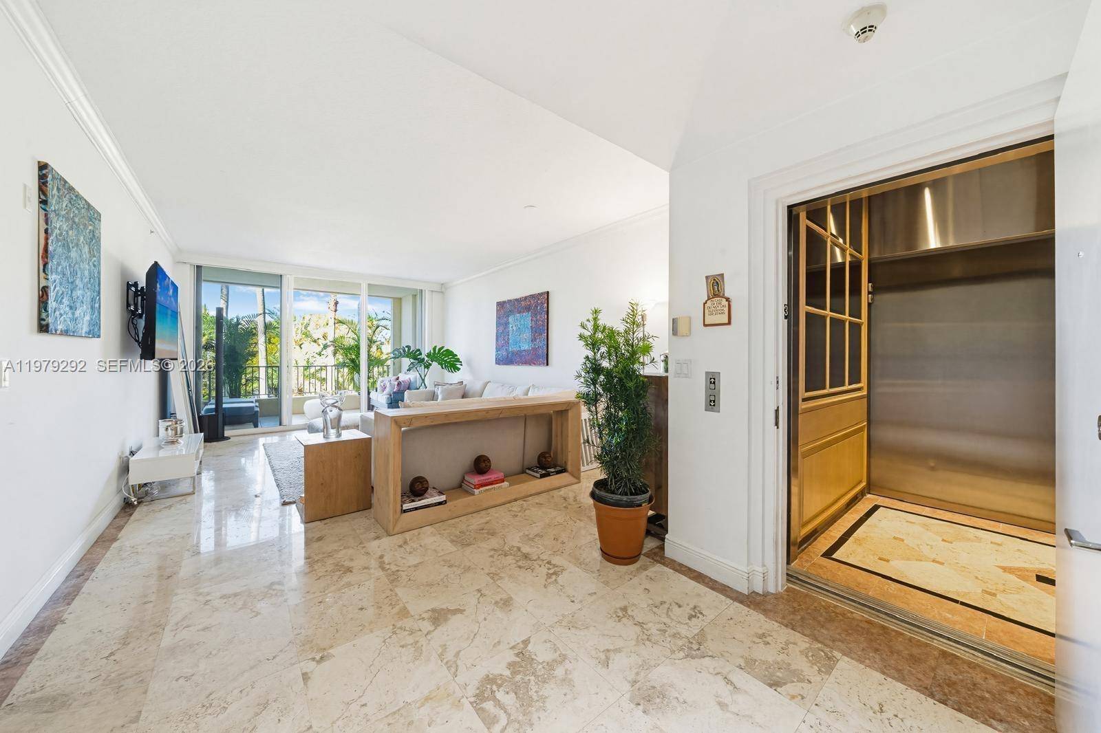 Enjoy oceanfront living in this stunning 3 Bedroom, 3 Bathroom remodeled unit in the serene and private Ocean Club in Key Biscayne.