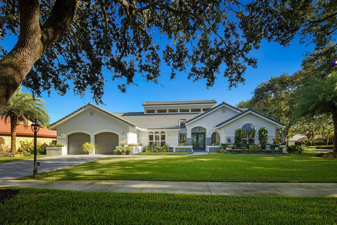 This Exquisite Estate in Delray Beach's Prestigious Rabbit Hollowe is a true tropical sanctuary in the heart of Delray Beach.