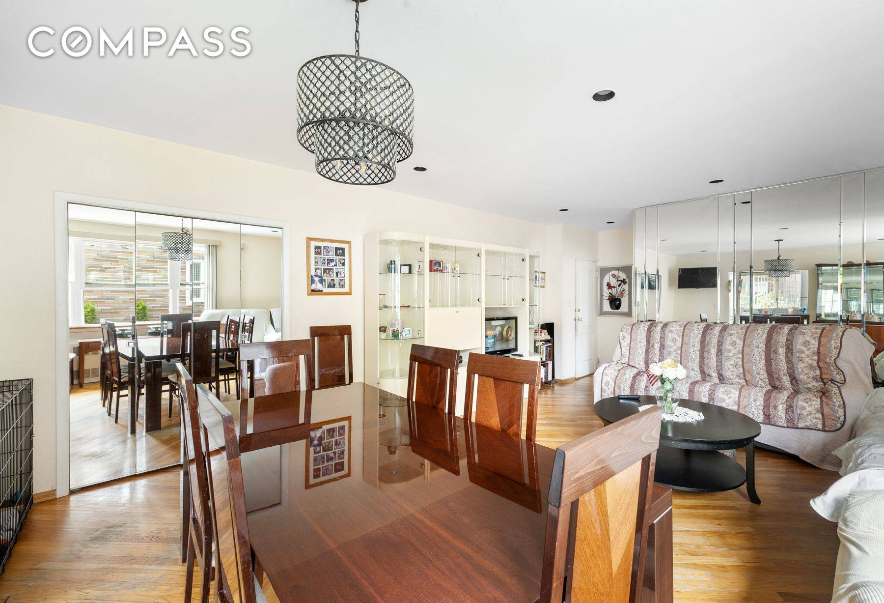 Semi detached three family with private driveway and detached garage on a 30 x 100 lot.