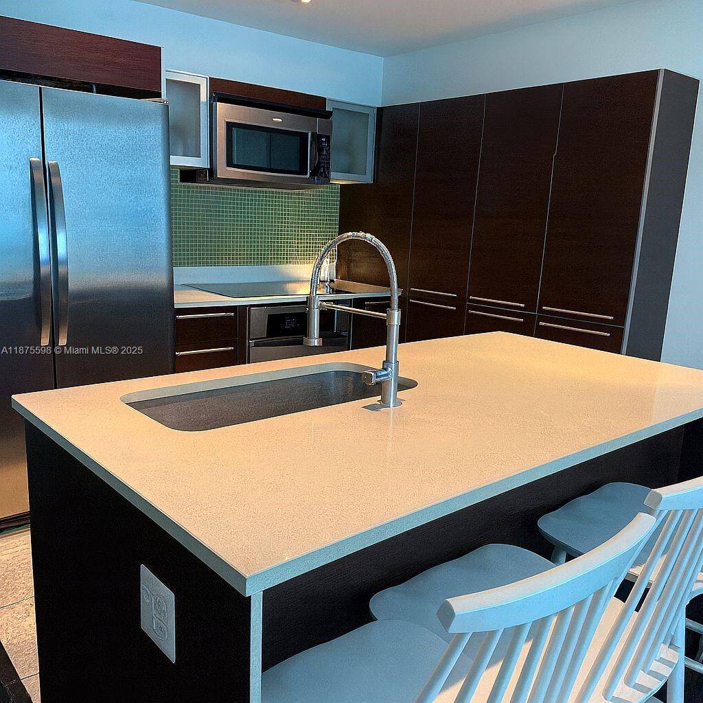 Live where Biscayne Bay meets the heartbeat of the city.