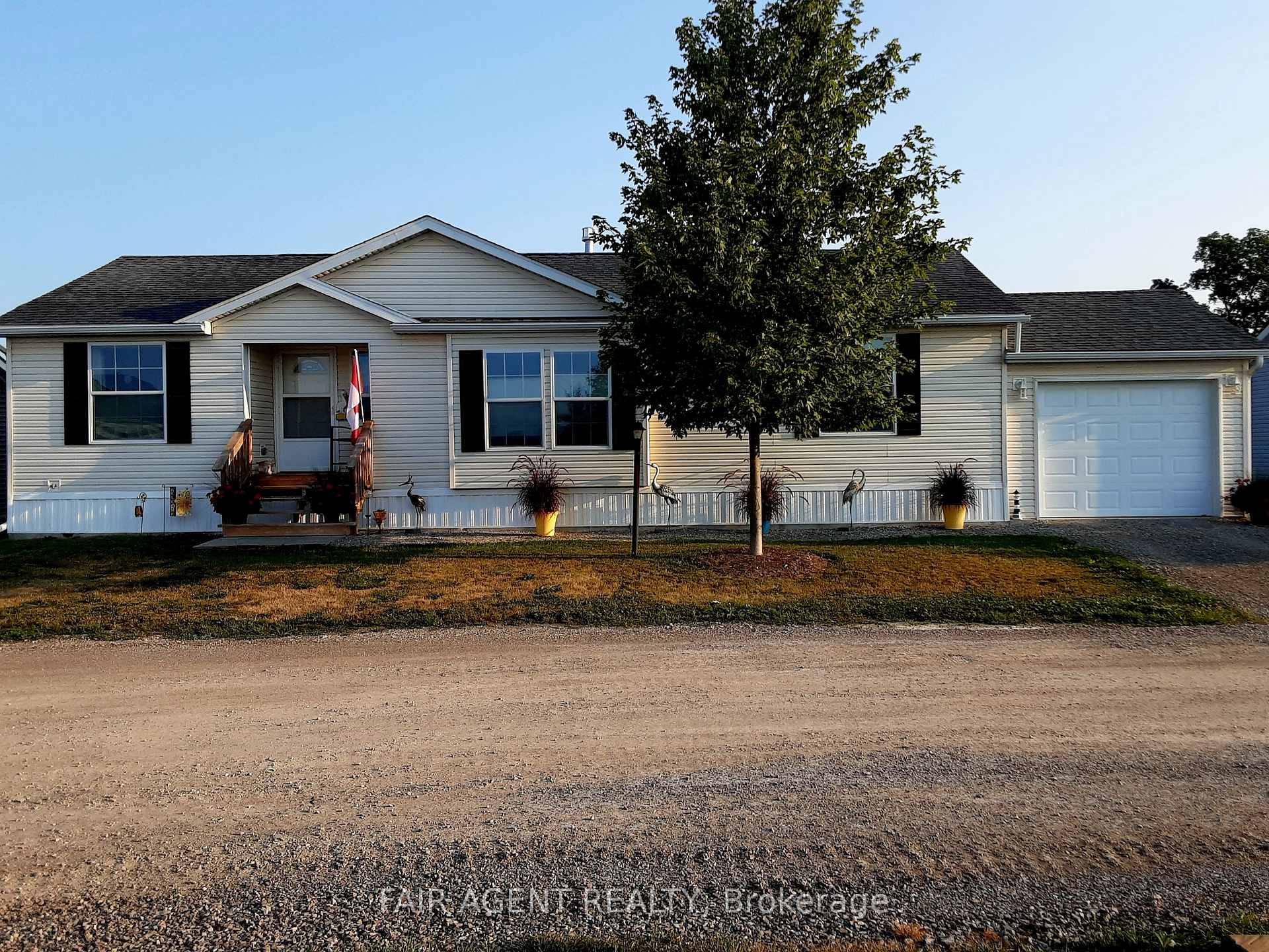 Welcome to 7 Forest Trail in Sandusk Creek Properties, where comfort and community come together.
