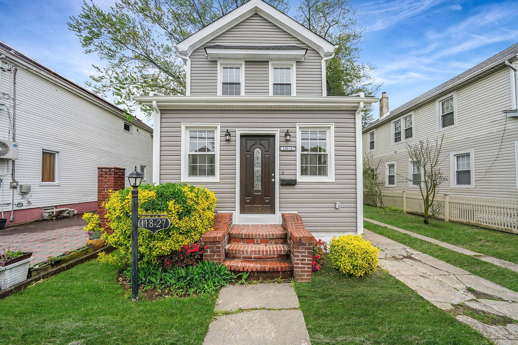 Welcome to 118 27 218th Street, a beautifully renovated single family home located in the heart of Cambria Heights.