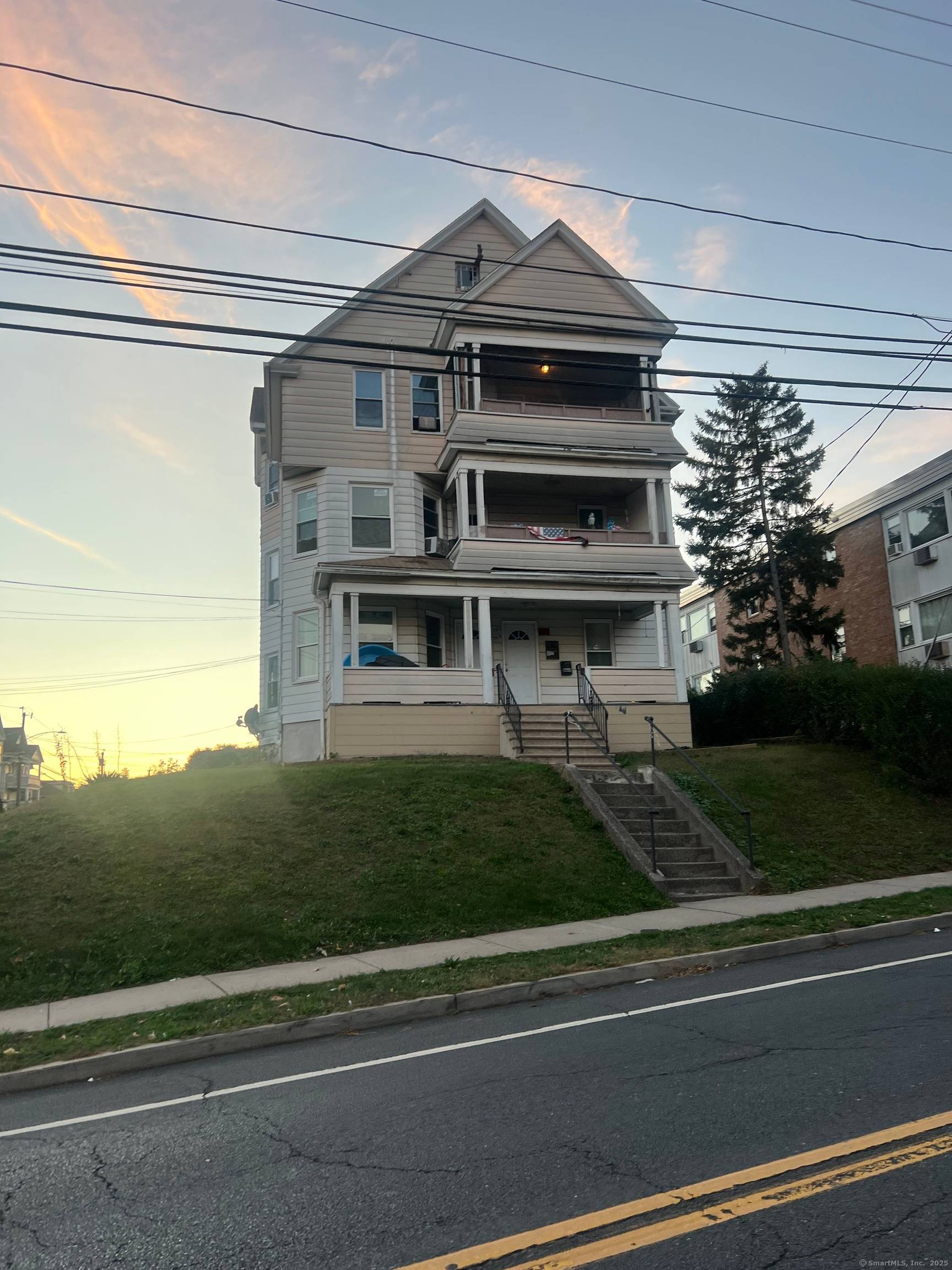 Fully leased updated 3 family house.