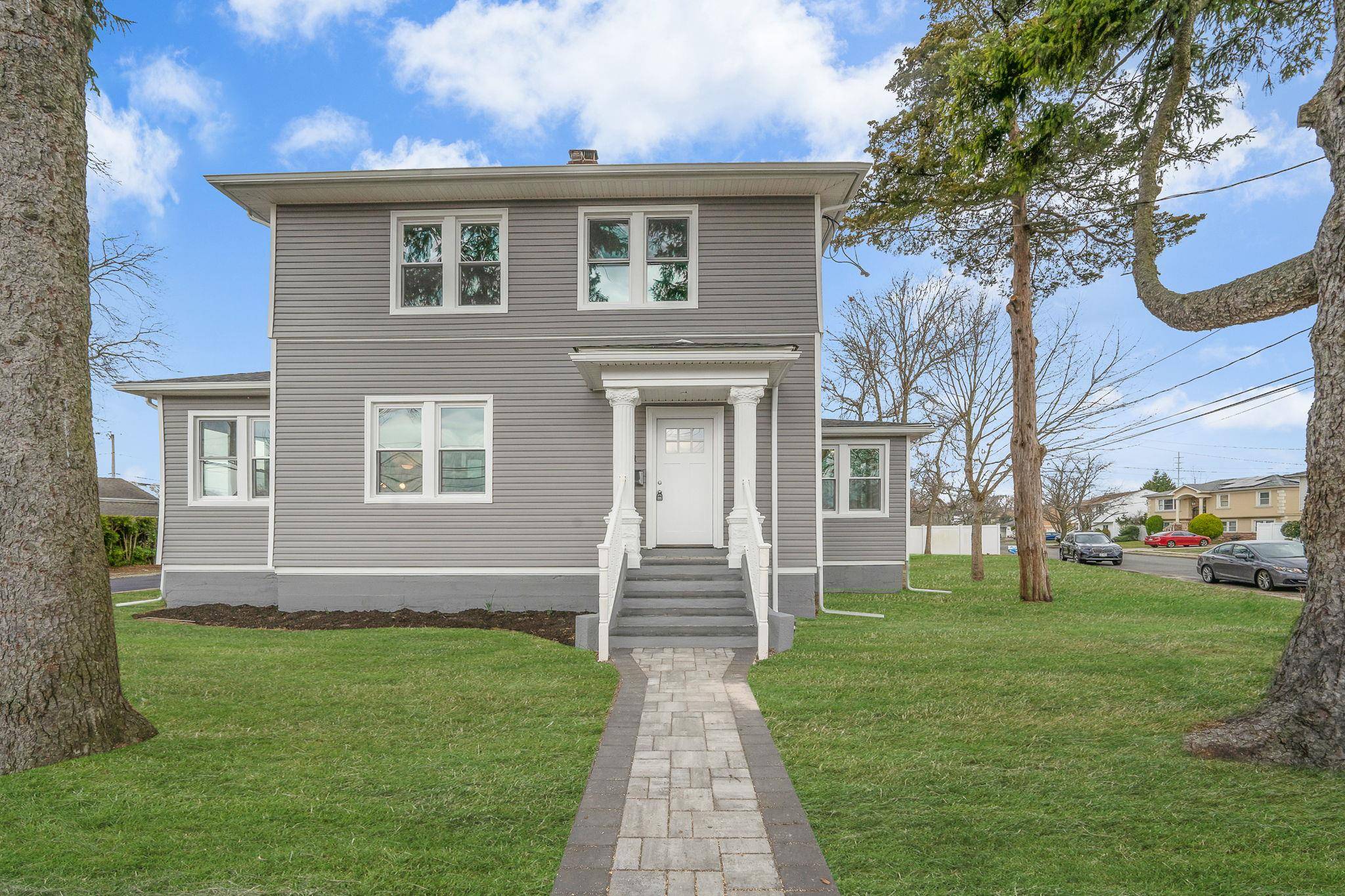 Welcome to this meticulously updated 4 bedroom, 2 bathroom Colonial home, offering a perfect blend of modern finishes and timeless elegance.