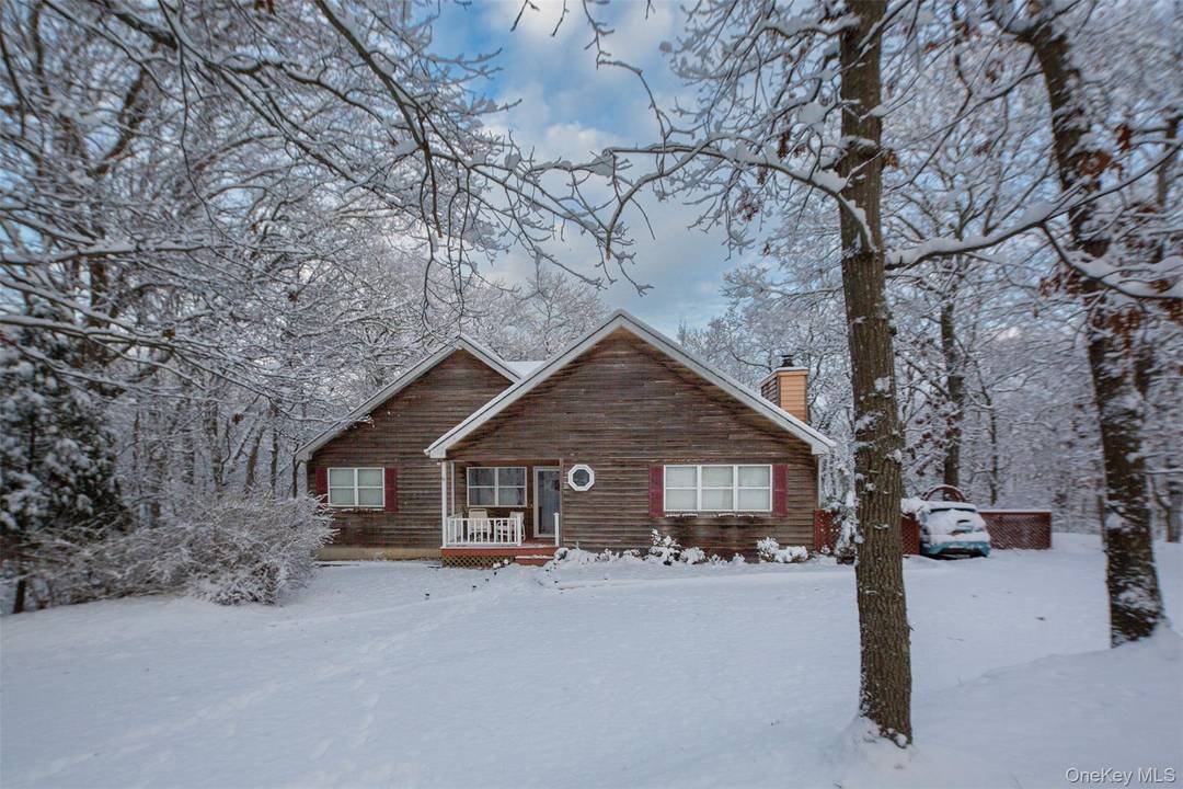 This 2, 500 square foot home is nestled in the Red Creek Ridge Development on a private, wooded one acre lot.