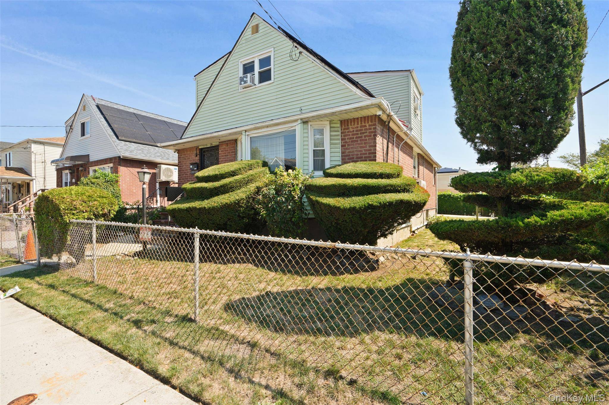 Detached Brick Cape, Well Maintained Two Family Home Location provides for ease of access to 2 highways, buses and railways in less than a 1 mile commute.