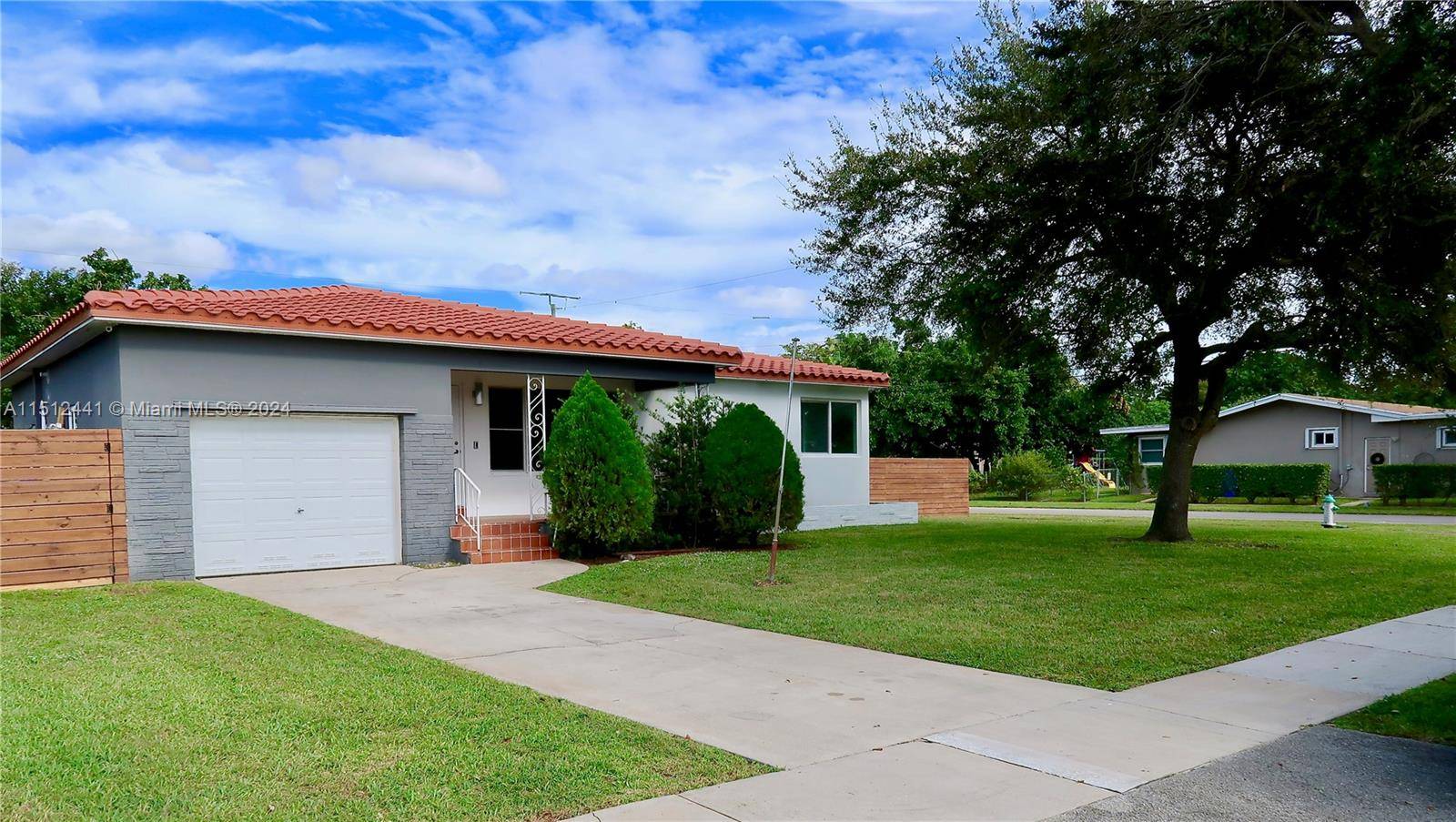 This beautiful home is in the heart of the desired Lawn Acres.