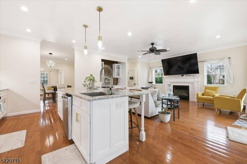 Welcome to 2020 Lamberts Mill Road in Scotch Plains a beautifully updated 4 bedroom, 3 full and 1 half bath home set on an expansive property with exceptional versatility and ...