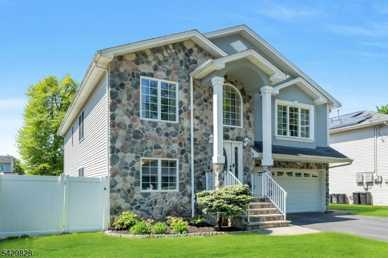Nestled in a quiet, desirable neighborhood with a cul de sac feel, this stunning young bi level with over 3200 sq ft offers a spectacular layout.