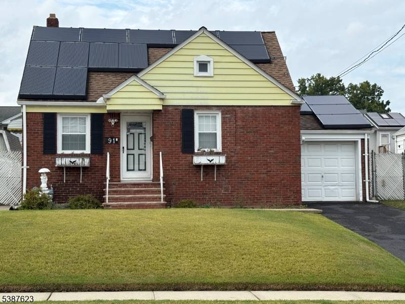 Curb Appeal Cape Cod with brick exterior.