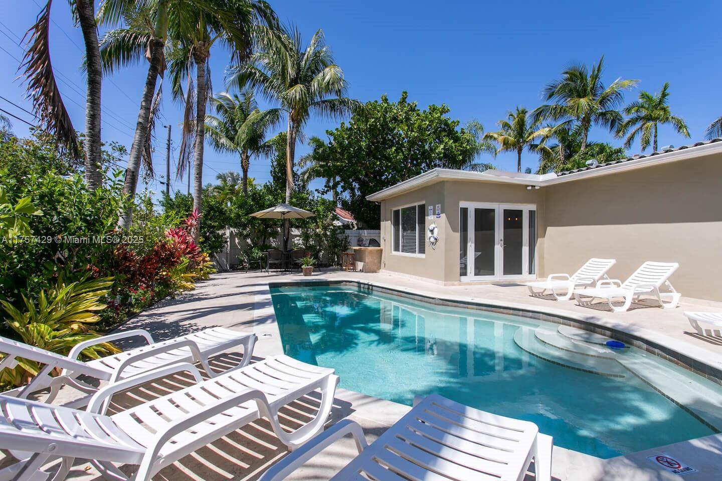 This beautifully upgraded 4 bedroom, 2 bath home is just minutes from Hollywood Beach yet tucked away in a quiet neighborhood.