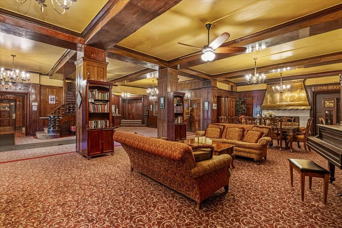 Unique 2 bedrooms 2 bath apartments located in historic Forest Hills Gardens looking over beautiful Station Square.