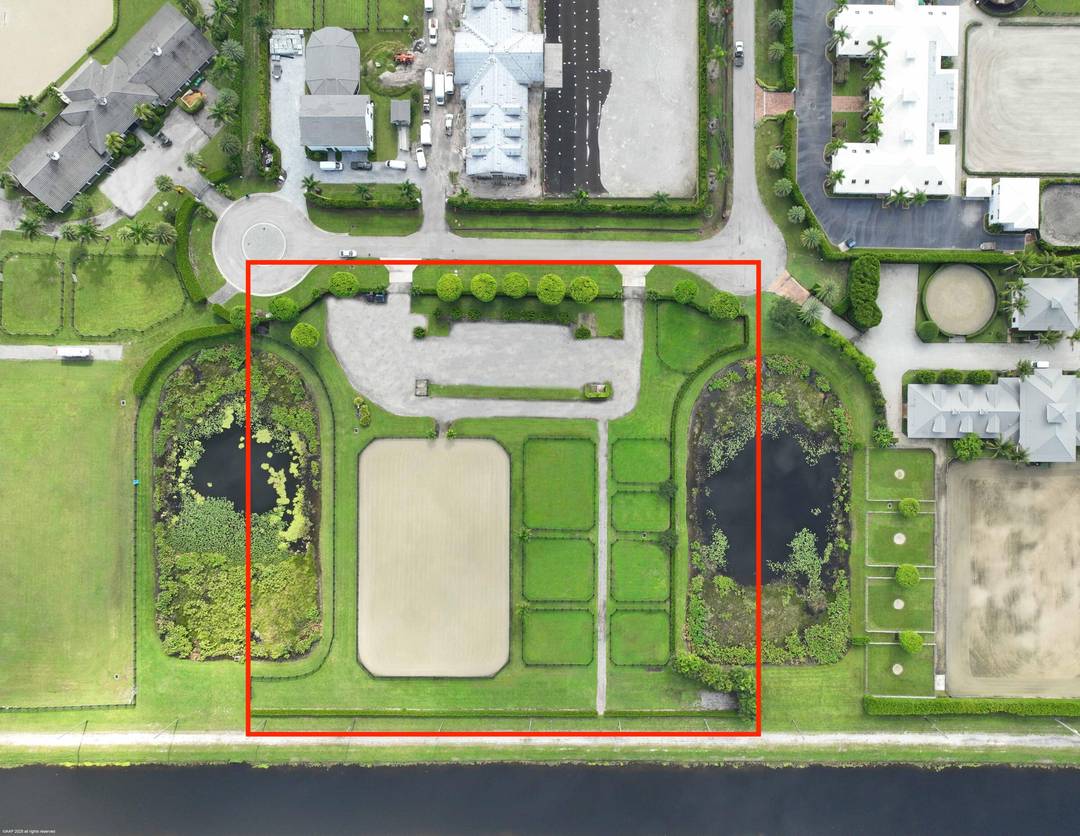 Rare 4. 38 acre parcel located within the prestigious gated community of Grand Prix Village South.