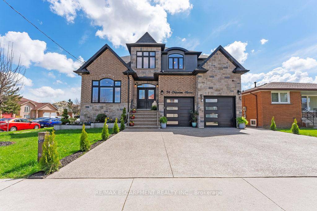 Welcome to 54 Chipman Avenue, an exceptional custom two storey home nestled in Hamilton's sought after Jerome neighborhood.