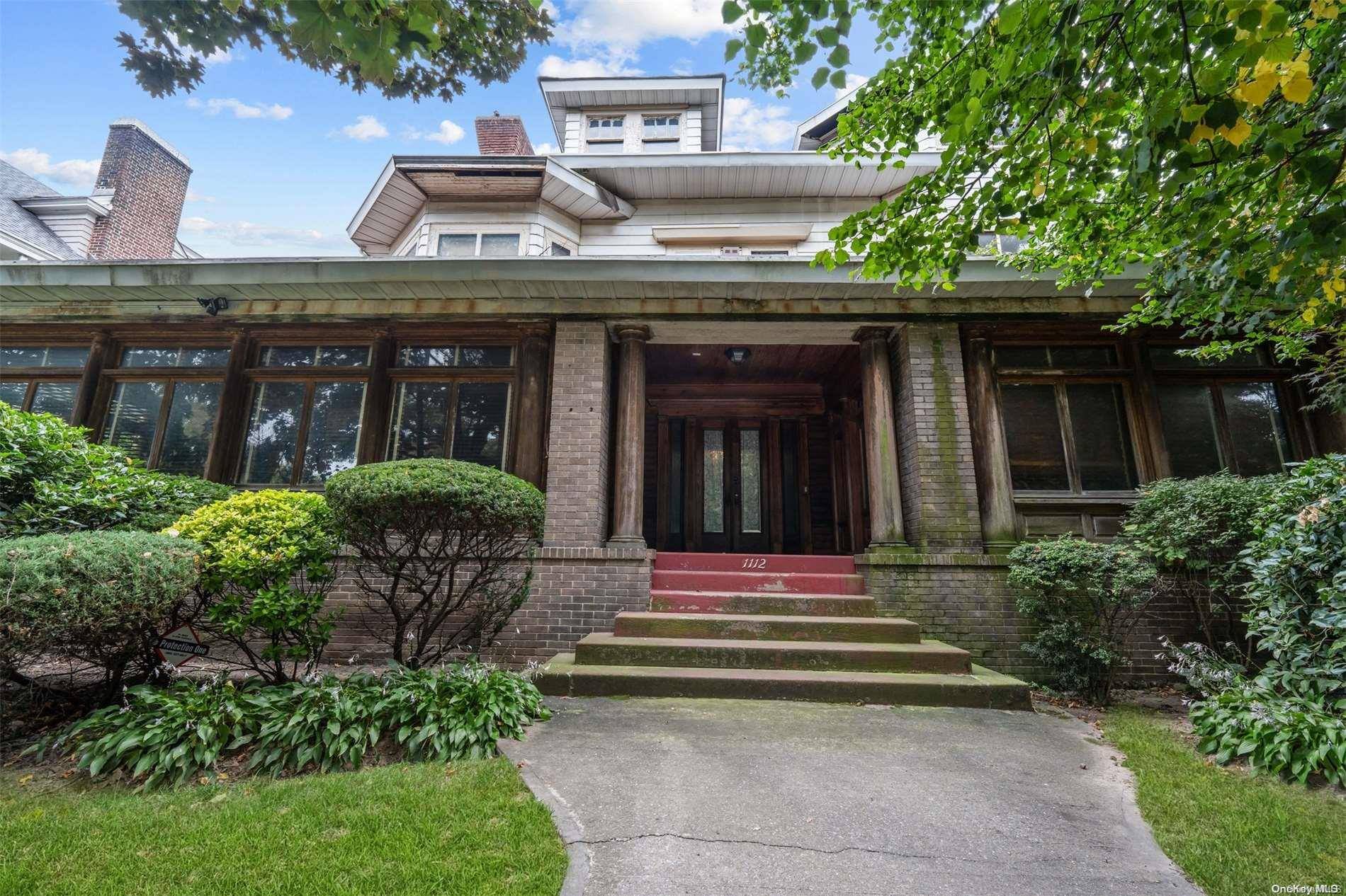 Discover the enchanting charm of 1112 Albemarle Rd, a mesmerizing home nestled on a picturesque tree lined block in the highly sought after neighborhood.