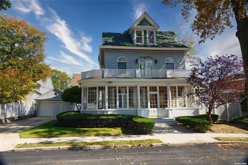 Welcome to this Stunning Queen Anne Victorian Home for sale in College Point NY.