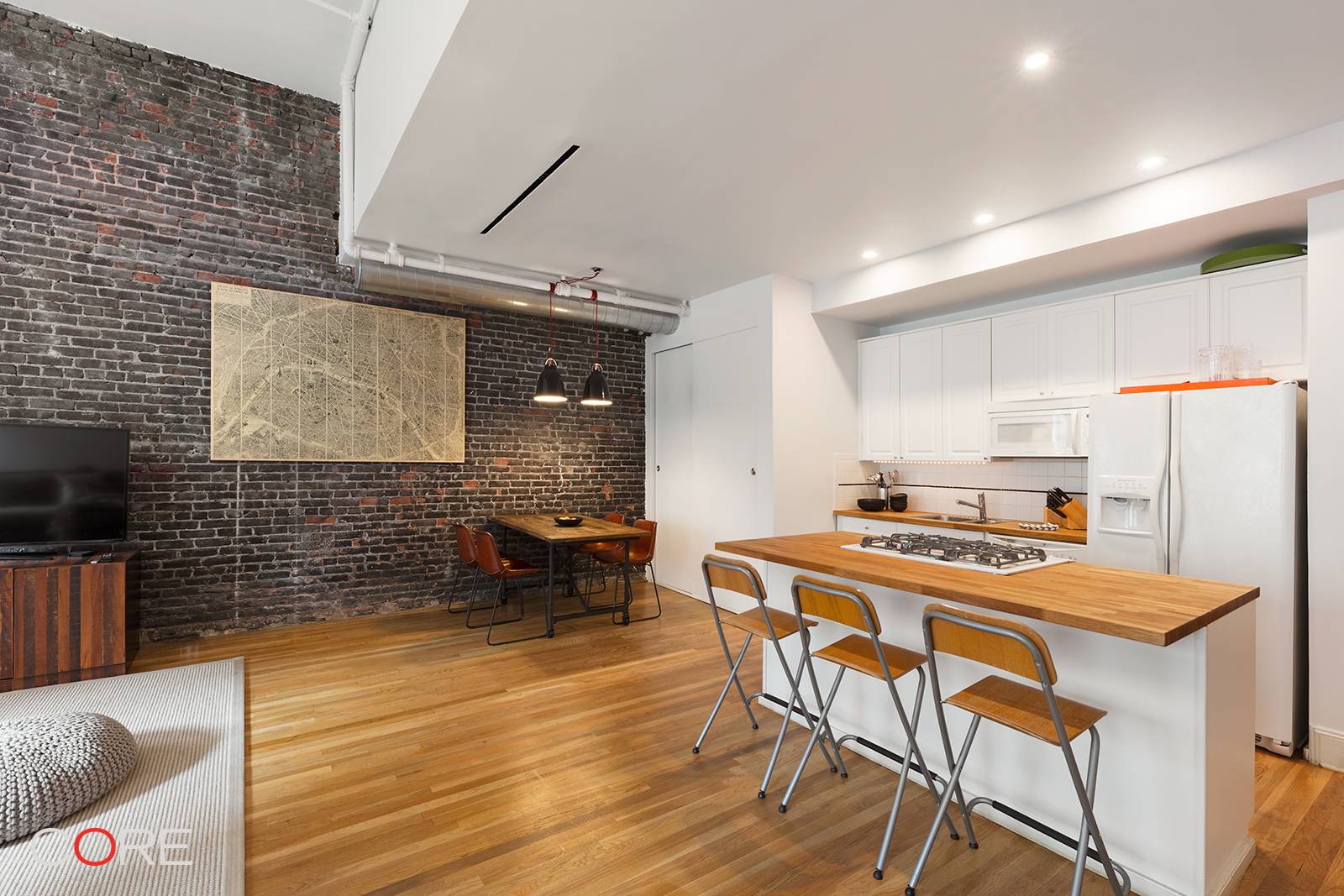 Authentic south facing duplex loft in the heart of Tribeca s historic district with soaring ceilings and oversized windows.
