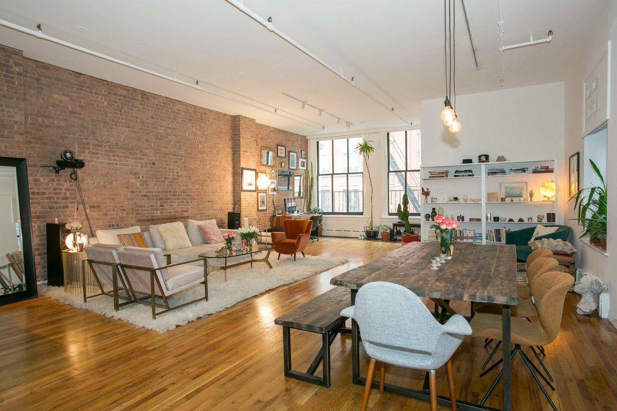 The Keyed Elevator opens directly into a floor through 2, 115 sqft of bright airy Loft with an oversized living room, pristine hardwood floors, dining room, and open kitchen.