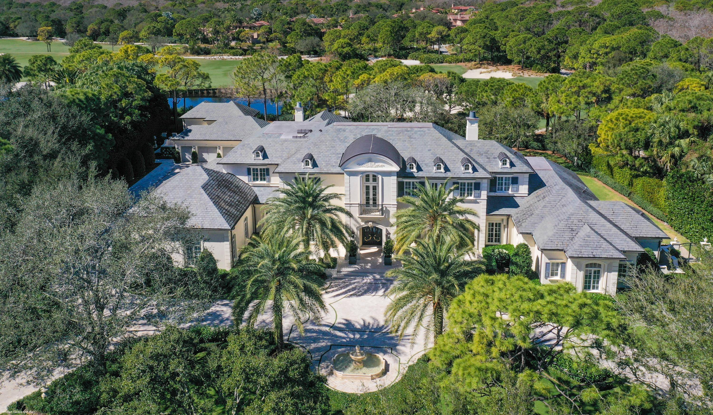 Elegant French Country estate home located on over 1.