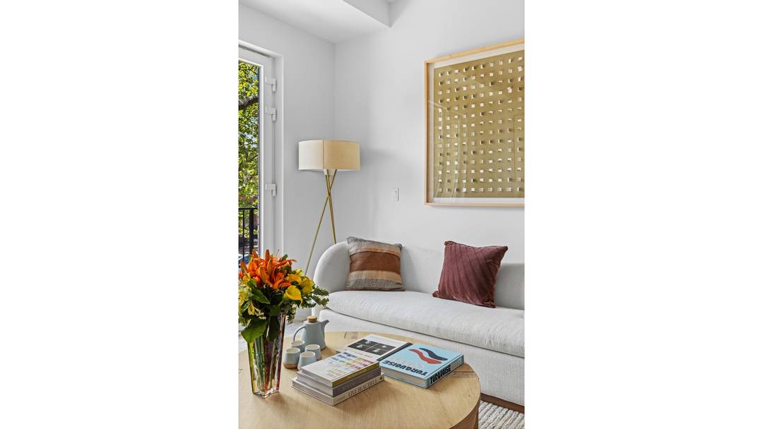 The home opens onto a traditional entryway, complemented by a private elevator entrance both leading directly into a spacious foyer.