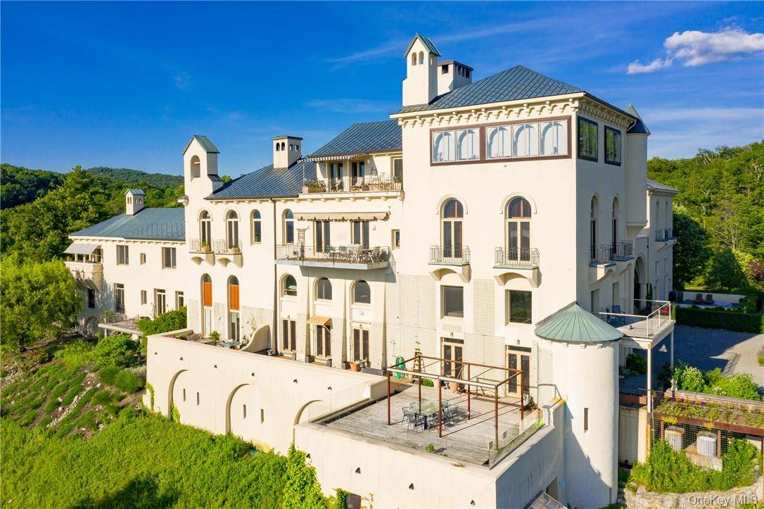 Live as if you are on vacation every day in this extraordinary 4, 950 sq.